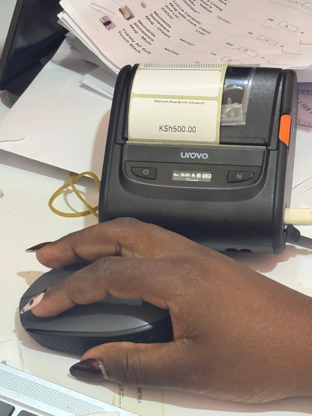 Urovo mobile printer producing a price label